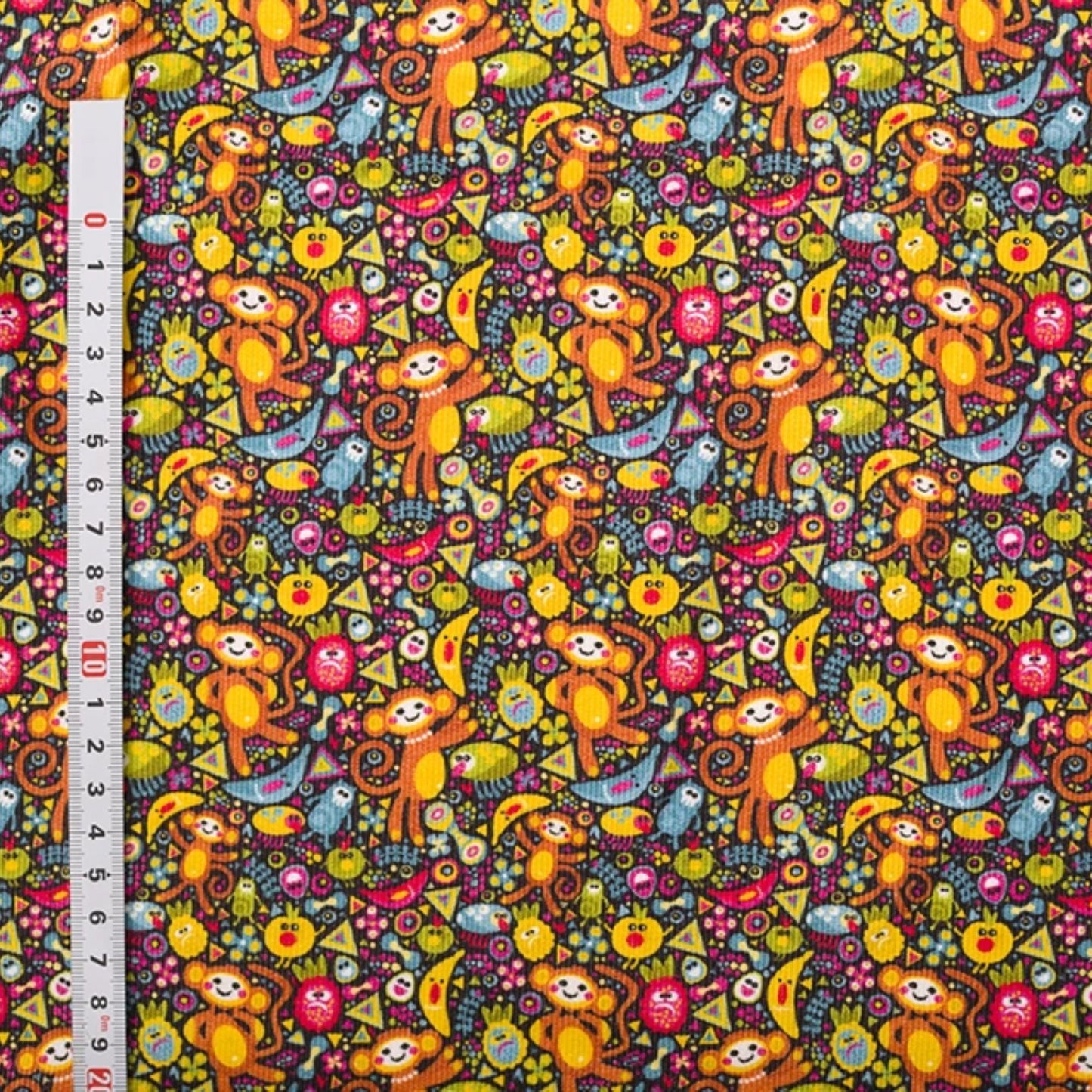 Needlecord 100% Fabric - Multi colour Monkeys on black background