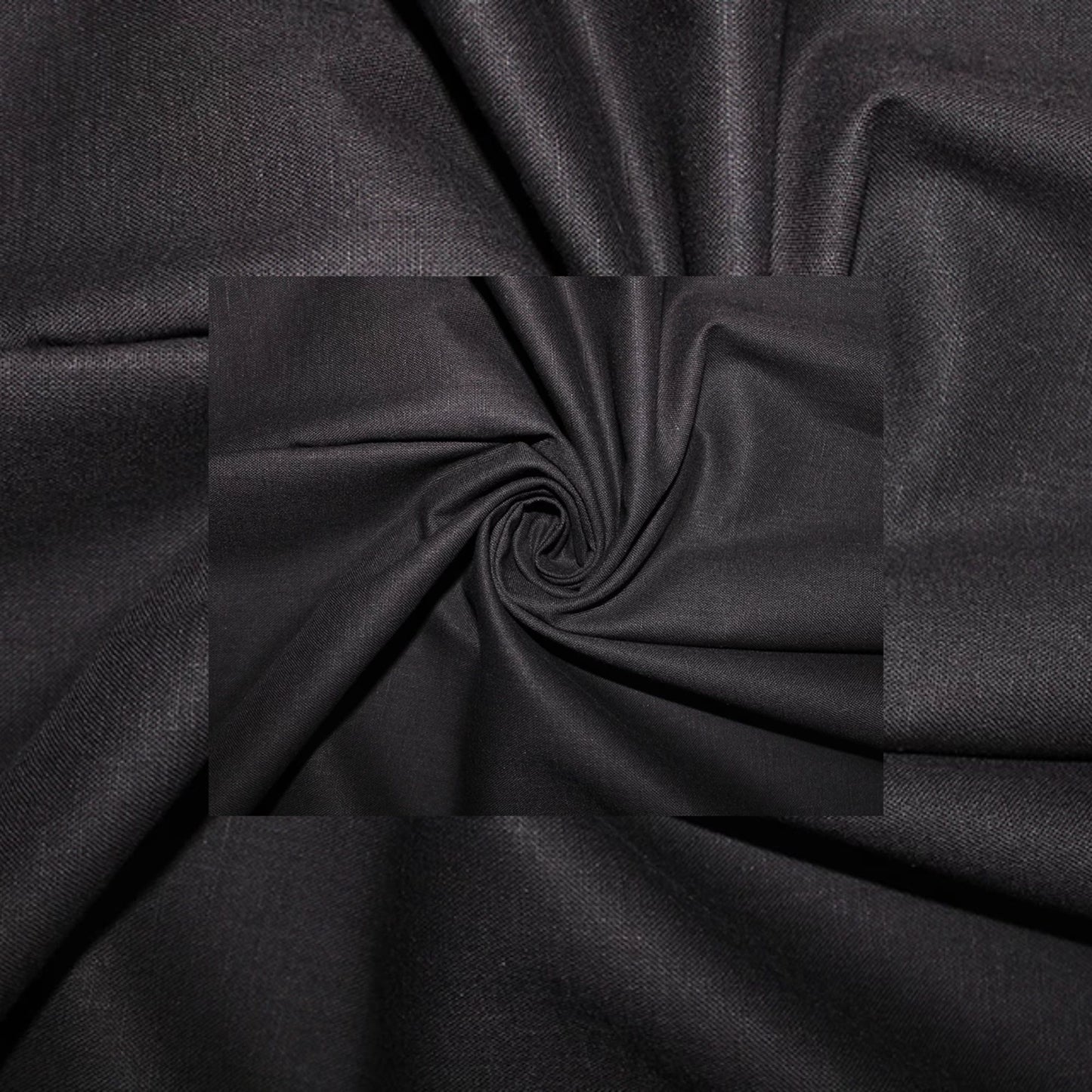 Black fabric draped in a central spiral pattern, showing a smooth texture and subtle sheen.