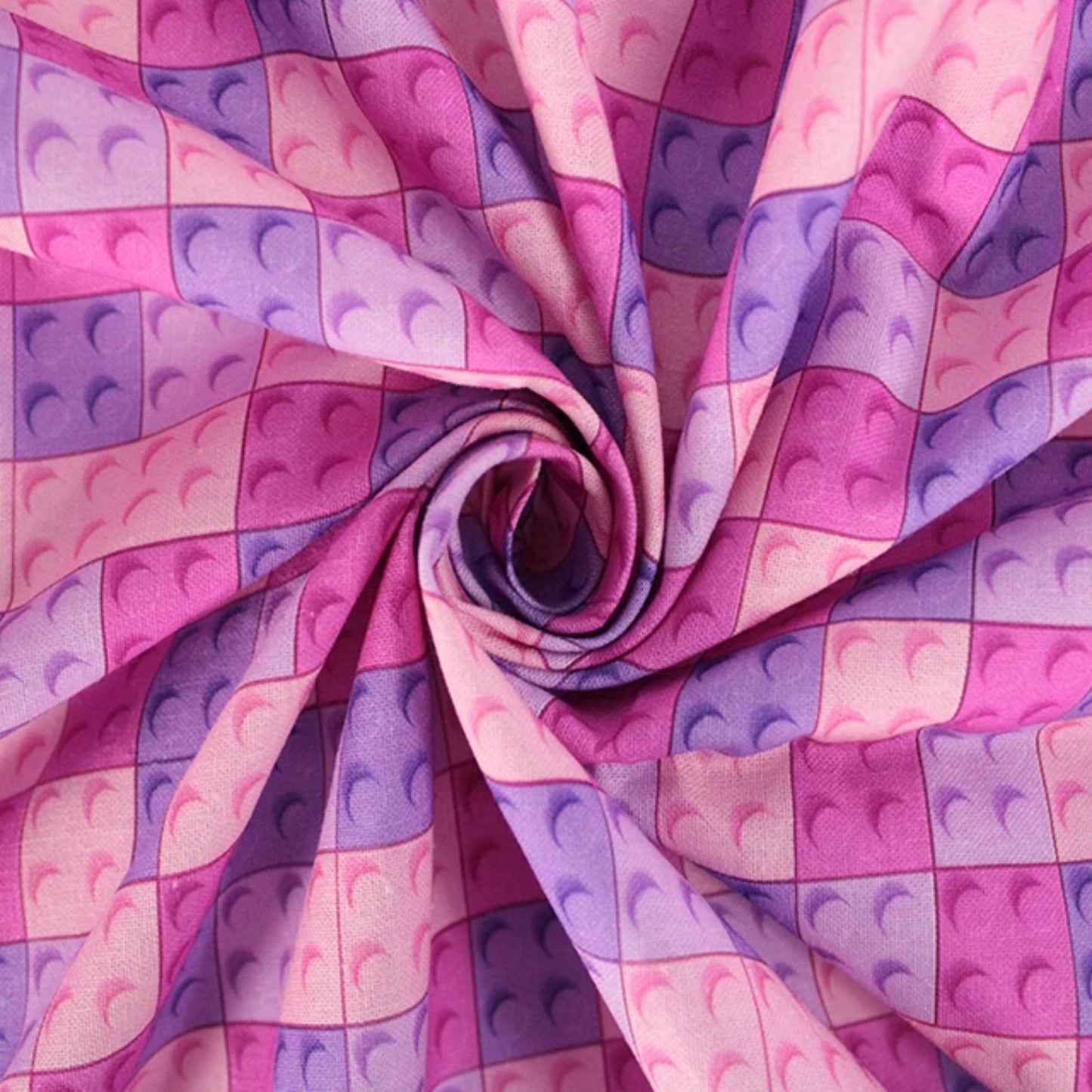 A repeating pattern of pink and purple toy building-block studs filling the frame, with no person, animal, or real environment visible.
